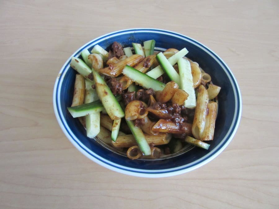 This version of zha jiang mian features pasta topped with a flavorful Chinese black bean sauce, ground beef and crunchy cucumber.