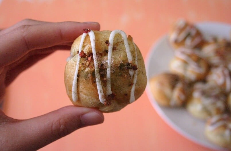 The basic cream puff gets an upgrade when the whipped cream filling is flavored with jasmine tea. #jasminetea #creampuffs #whippedcream #dessert