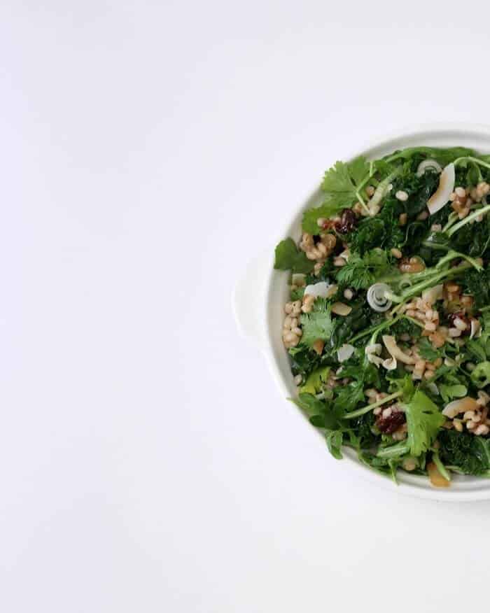 This barley kale salad with toasted coconut is a study in deep greens, and is just as gorgeous mixed as it is separated. #barley #kalesalad #coconut #salad