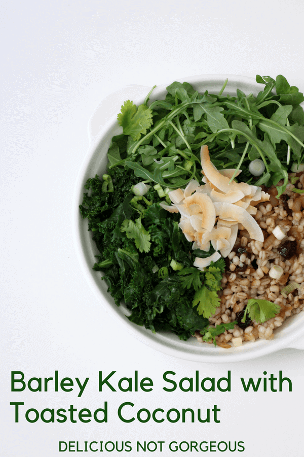 This barley kale salad with toasted coconut is the grains + greens salad you never knew you needed. Paired with sweet/tart dried cherries and punchy sesame soy vinaigrette, it's a delicious make-ahead lunch. #barley #kalesalad #coconut #salad